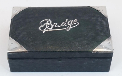 An Edwardian silver mounted green leather Bridge box, Birmingham, 1908, Charles Penny Brown, of rectangular form with applied silver corners and 'Bridge' detail to hinged lid, 11.5 x 18.2 x 6cm