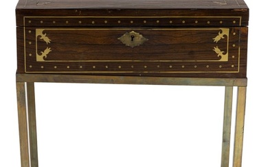 An English brass inlaid rosewood travel desk on stand