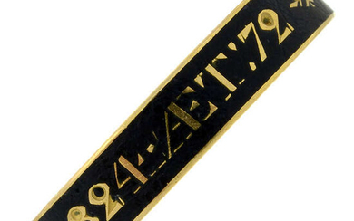 A Georgian 18ct gold black enamel mourning ring.