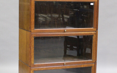 An early 20th century Globe Wernicke style oak three-section bookcase, height 136cm, width 88cm, dep