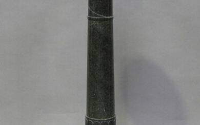 An early 20th century green serpentine sectional display pedestal, raised on an octagonal base, heig