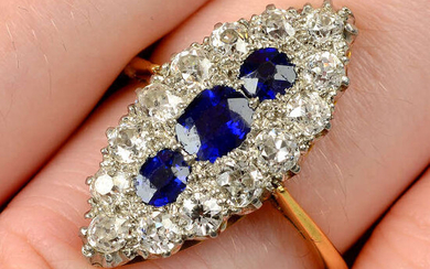 An early 20th century platinum and 18ct gold, sapphire and old-cut diamond navette-shape cluster ring.