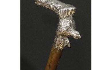 An early 20th century silver mounted novelty walking stick, ...