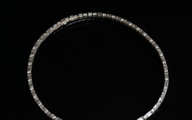 An impressive 18ct white gold riviere necklace set with alte...
