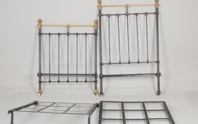 An iron bed, black lacquered metal and brass, late 19th century.