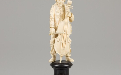 An ivory sculpture of a man with bass, 19th century.