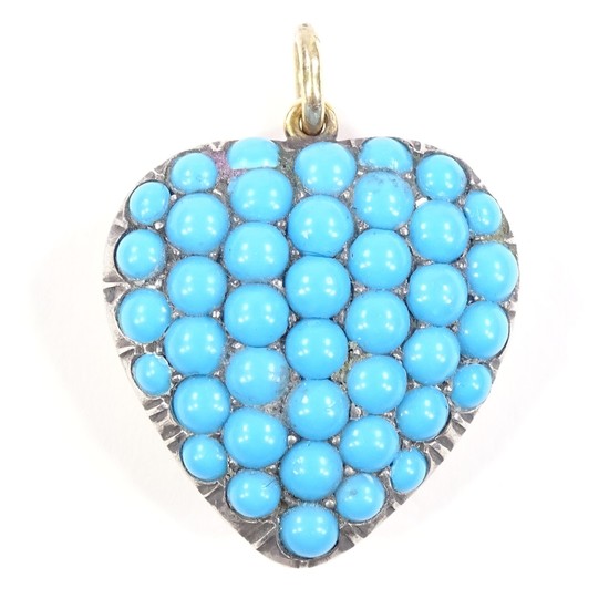 An unmarked gold blue stone pave-set heart pendant, height e...