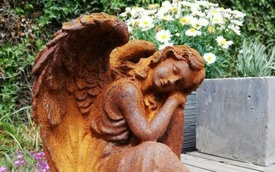 Antique garden sculpture of an Angel - romantic garden
