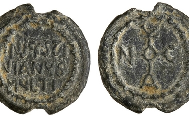 Byzantine Empire. Lead Seal, ca. 6th-7th Centuries. 29mm, 17.2 gms. Cruciform monogram within w...