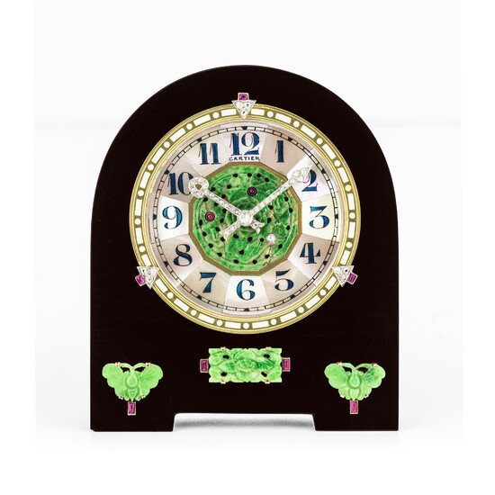 CARTIER, ONYX, JADE, MOTHER OF PEARL WITH DIAMOND AND RUBY-SET DESK CLOCK