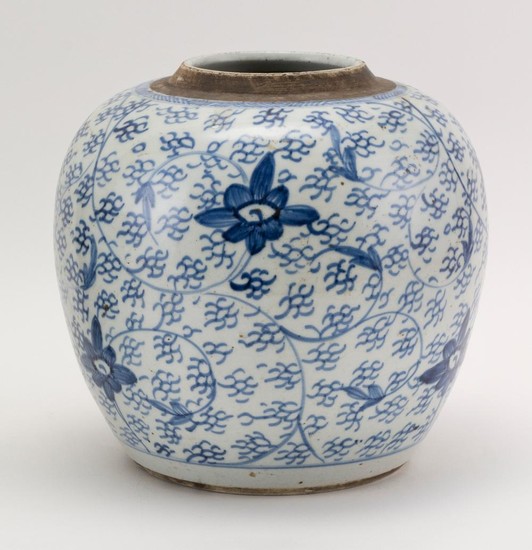 CHINESE BLUE AND WHITE PORCELAIN GINGER JAR With lotus flower and vine decoration and a double foot ring. No cover. Height 10". Diam...