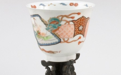 CHINESE POLYCHROME PORCELAIN CUP Exterior decorated with bird and floral cartouches connected with a brocade banner. Interior rim wi...