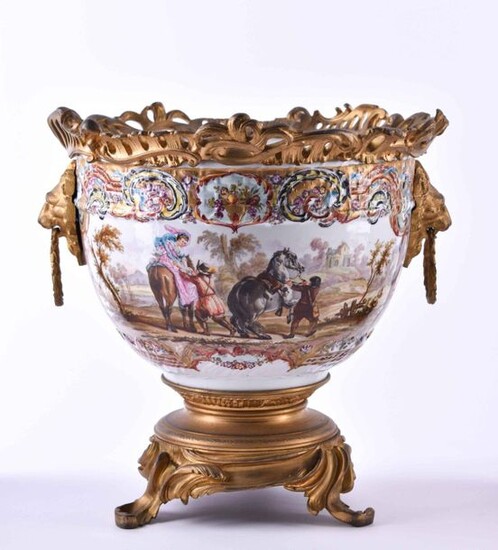 Cache Pot Samson Paris 1860/80 | Cache pot Samson Paris 1860/80,colored and gold plated, decorated with fire-gilt bronze applications, two handles in form of lion heads on the sides, on the front and back with paintings after Wouvermanns, underneath...