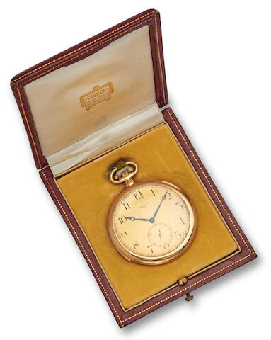 Cartier, Paris. A fine 18K gold slim openface minute repeating watch
