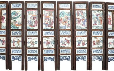 Chinese wooden folding screen consisting of eight panels with porcelain plaques, decorated...