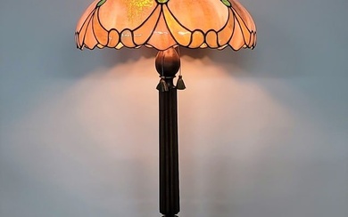 Circa 1920's Leaded Glass Carved Wooden Base Floor Lamp with antique carmel slag glass shade. Hgt