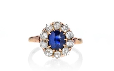 Daisy ring in yellow gold, diamonds and oval sapphire