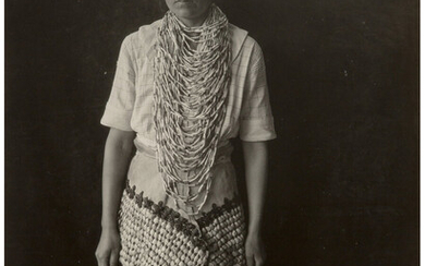 Edward Sheriff Curtis (1868-1952), Untitled (Young woman in a woven cap and beaded dress) (circa 1920s)