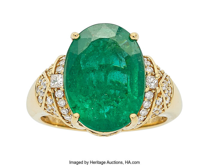 Emerald, Diamond, Gold Ring Stones: Oval-shaped emerald weighing 6.36...