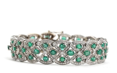 Emerald and diamond bracelet set with numerous faceted emeralds totalling app. 9.60...