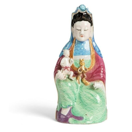 FAMILLE ROSE SEATED GUANYIN BESTOWING A SON QING