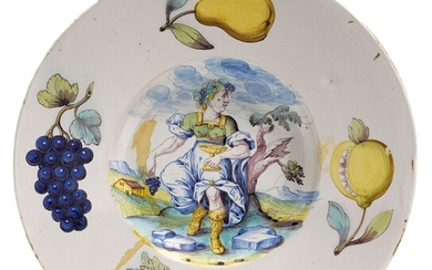FAYENCE BREITRANDTELLERWinterthur, vers 1680.Gris clair émaillé et peint avec des couleurs vives de feu, dans...