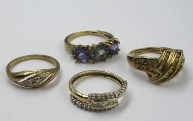 Four various 9ct gold stone set dress rings