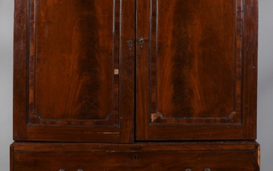 GEORGE III STYLE MAHOGANY WARDROBE, MID-19TH CENTURY 80 3/4 x 49 1/2 x 23 in. (205.1 x 125.7 x 58.4 cm.)