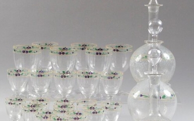GLASS SERVICE PART, in faceted crystal with painted decoration of plums and leafy branches, comprising: six water glasses, five red wine glasses, eleven white wine glasses and three decanters (with attached stoppers). Water glass, H: 15 cm Red wine...