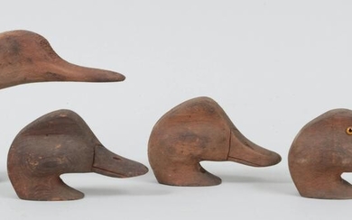 Group of (4) unpainted L.I. South Shore decoy heads