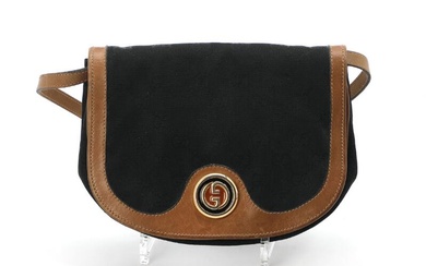 Gucci A vintage bag of black monogram canvas with brown leather trimmings,...