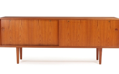 Hans J. Wegner: “RY 26”. A teak sideboard with two sliding doors. Manufactured by Ry Furniture. H. 79. W. 200. D. 49 cm.