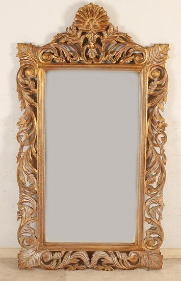 Large gilded wood carved mirror with facet cut mirror