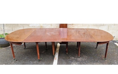 Mahogany dining table of D-shaped ends, circa 1800, fitted a...