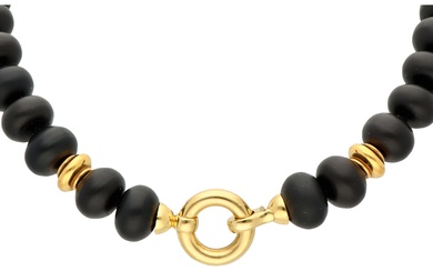 Necklace of matted onyx with 18K yellow gold lock.