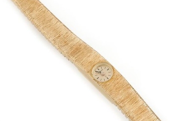 OMEGA, Ladies' wristwatch in 18K (750/°°) satin-finish yellow...
