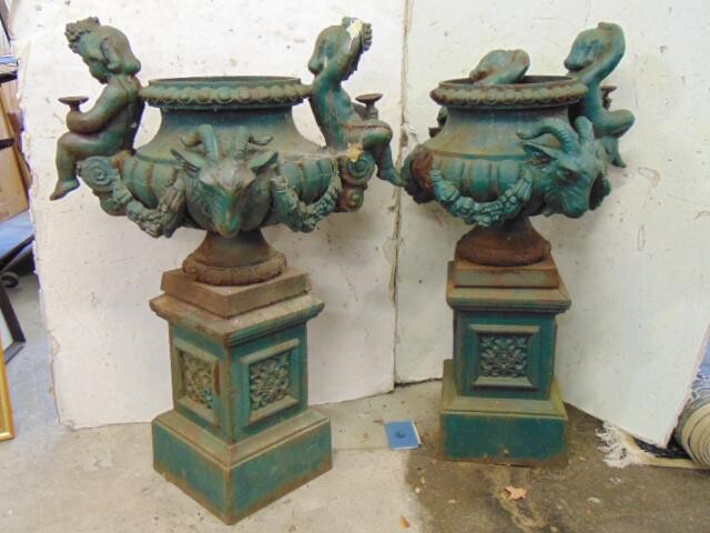 Pair cast iron garden urns on pedestal bases
