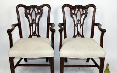 Pair of Wellington Hall mahogany armchairs