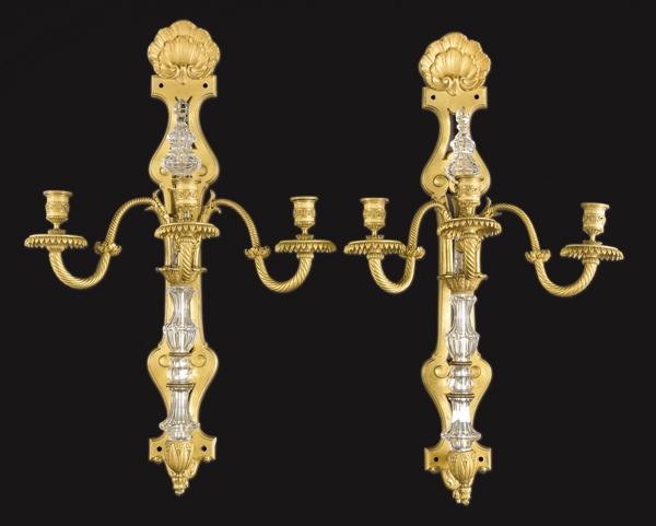 Pair of gold bronze and carved crystal sconces S. XIX.