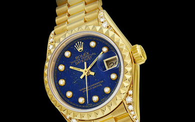 ROLEX. A LADY’S 18K GOLD AND DIAMOND-SET AUTOMATIC WRISTWATCH WITH SWEEP CENTRE SECONDS, DATE, BRACELET AND LAPIS LAZULI DIAL DATEJUST MODEL, REF. 69188