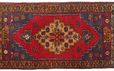 Rectangular Persian red and blue ground rug having an allove...