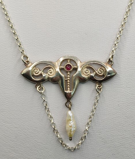 Ruby necklace, open worked middle part with small natural ruby as well as centrally suspended