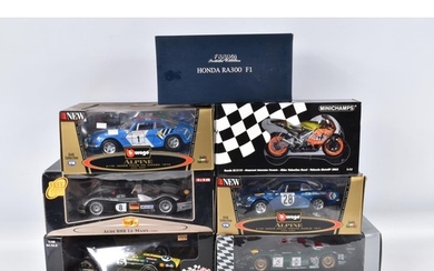SEVEN BOXED DIECAST MODEL RACING VEHICLES, the first a 1:18 ...