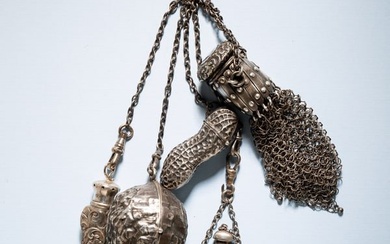 STERLING CHATELAINE WITH UNUSUAL CHARMS.