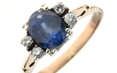 Sapphire and diamond ring, unmarked, the oval cut sapphire...