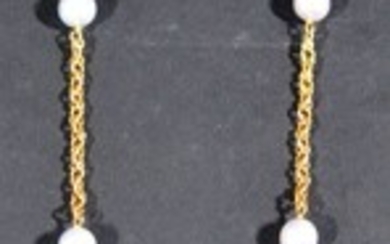 Sautoir en or jaune 18 K (750/oo) à maille royale en alternance de perles de...