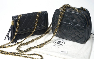 Set of two black Chanel brand bags including : A silk quilted evening bag - evening clutch with leather edge. Monogram in relief inside the flap. Shoulder strap with golden links and black leather ribbon. And the other, a "Camera" model in black...