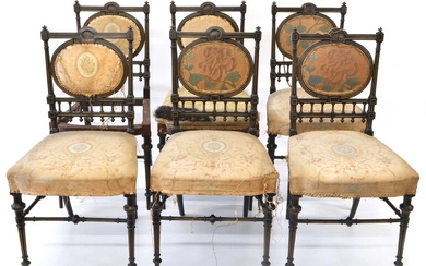 Six Regency style Ebonised and Parcel Gilt Hall Chairs