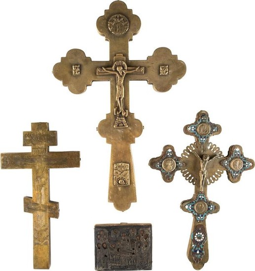 THREE BRASS CRUCIFIXES AND A MINIATURE ICON SHOWING THE