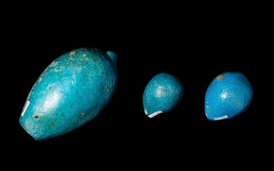 THREE EGYPTIAN TURQUOISE FAIENCE FIG MODELS
